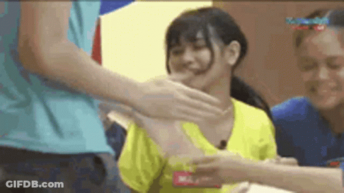 Woman In Yellow Shirt Slapped By Man GIF