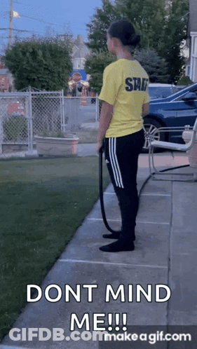 Woman In Yellow Shirt With Shit GIF