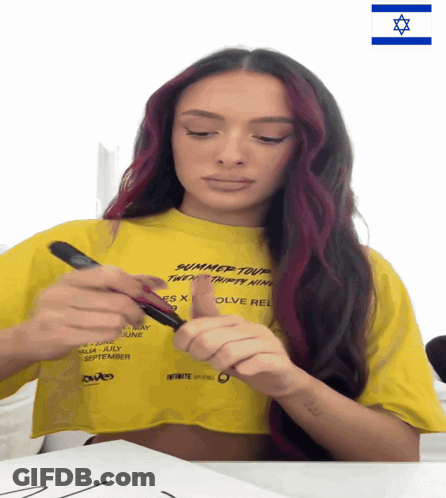 Woman In Yellow Summer Tour Shirt GIF