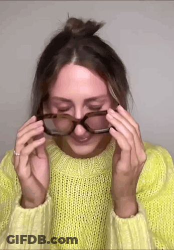Woman In Yellow Sweater And Glasses GIF