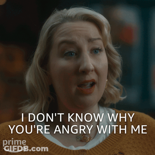 Woman In Yellow Sweater Says I Don't Know Why You're Angry With Me GIF