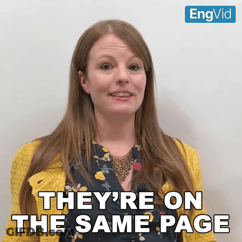 Woman In Yellow Sweater Says They're On The Same Page GIF