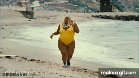 Woman In Yellow Swimsuit Running On Beach GIF