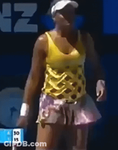 Woman In Yellow Tank Top And Pink Skirt Standing In Front Of Sign Saying 30 15 GIF