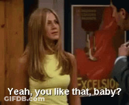 Woman In Yellow Tank Top Says Yeah You Like That Baby To Man In Suit GIF