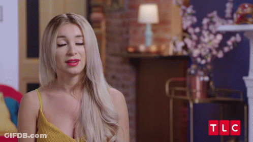 Woman In Yellow Tank Top With TLC GIF
