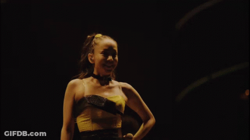 Woman In Yellow Top Dancing GIF