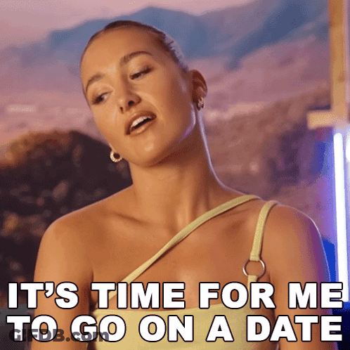 Woman In Yellow Top Saying It's Time For Date GIF