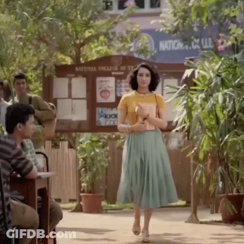 Woman In Yellow Walking National College Of Technology GIF