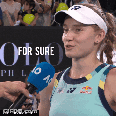 Woman In Yonex Hat Being Interviewed GIF