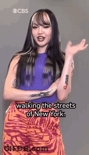 Woman In Zebra Print Pants Walking In New York GIF