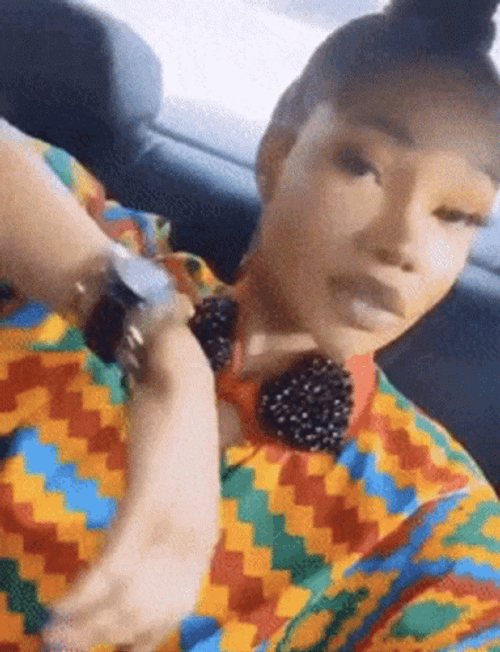 Woman Inside The Car Flexing Watch GIF
