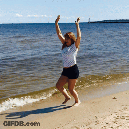 Woman Jumping On Beach GIF