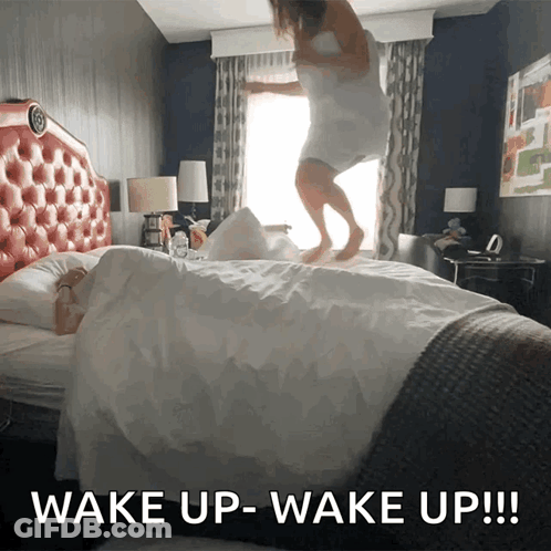 Woman Jumping On Bed Wake Up GIF