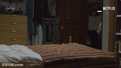 Woman Jumping On Bed With Netflix Logo GIF