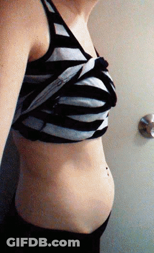 Woman Keeps Track Of Pregnant Belly Bump GIF
