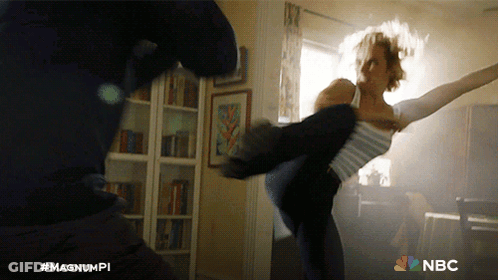 Woman Kicked In Air By Man With NBC GIF