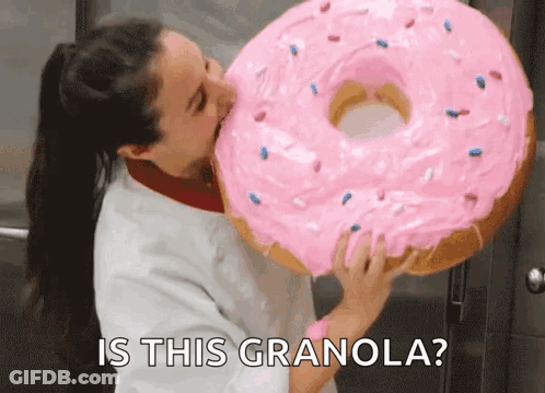 Woman Kissing Giant Pink Donut Saying Is This Granola GIF