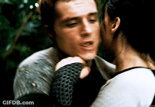Woman Kissing Man On Cheek GIF