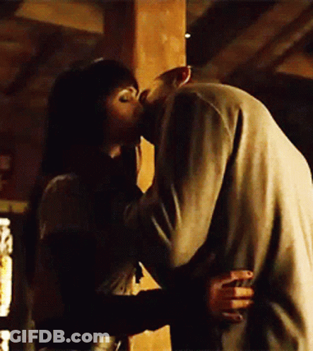 Woman Kissing Man On Cheek GIF