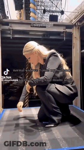 Woman Kneeling In Front Of Miss My Husband Sign GIF