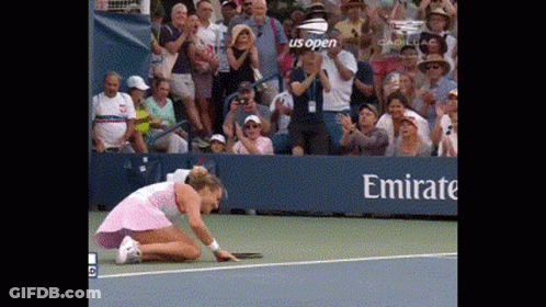 Woman Kneeling On Tennis Court GIF