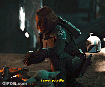 Woman Kneeling With Baby Says I Saved Your Life GIF