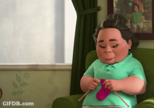 Woman Knitting Green Socks GIF