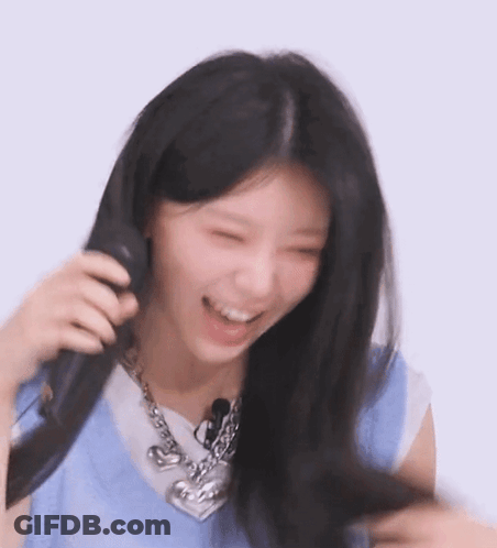 Woman Laughing And Holding Microphone GIF
