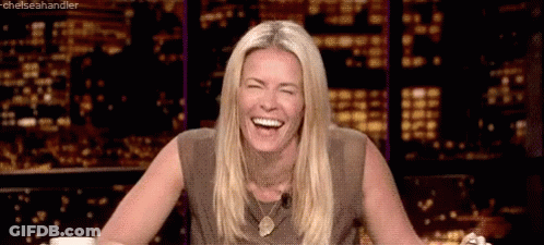 Woman Laughing At Night City GIF