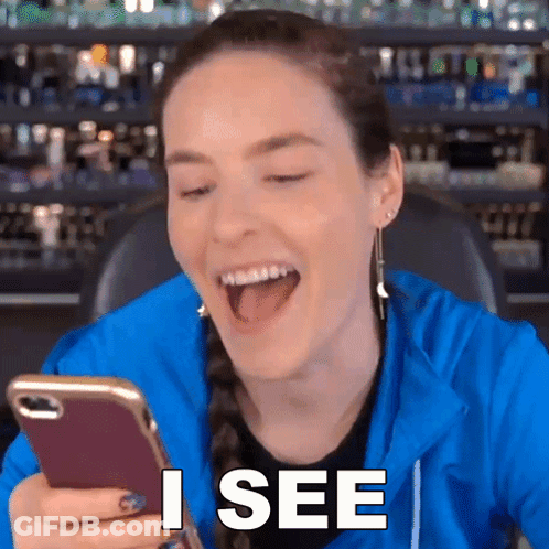 Woman Laughing At Phone I See GIF