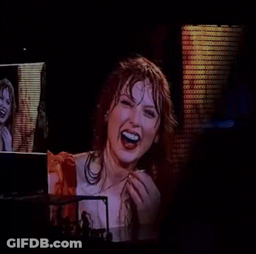 Woman Laughing At Screen Saying A GIF
