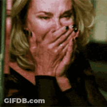 Woman Laughing Covering Mouth With Hands GIF