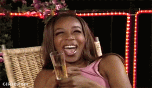 Woman Laughing Holding Beer GIF