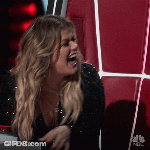 Woman Laughing In Chair With NBC Logo GIF