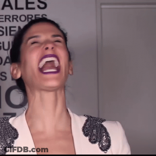 Woman Laughing In Front Of Ales Sign GIF