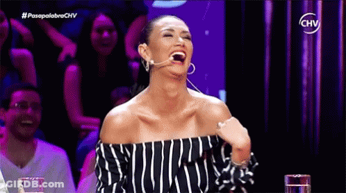 Woman Laughing In Front Of Crowd On TV Show GIF
