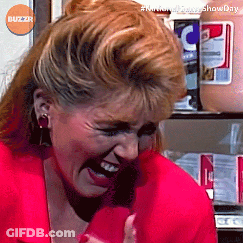 Woman Laughing In Front Of Fridge With Buzzr Logo GIF
