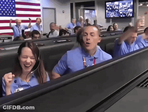 Woman Laughing In Front Of Man With Headsets GIF