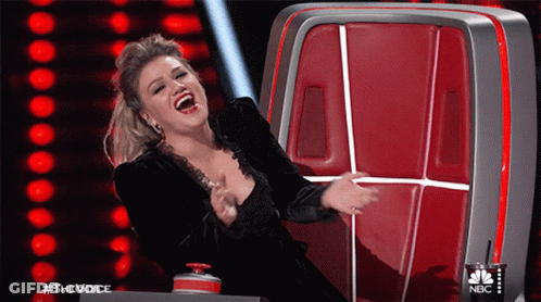 Woman Laughing In Front Of NBC Television GIF