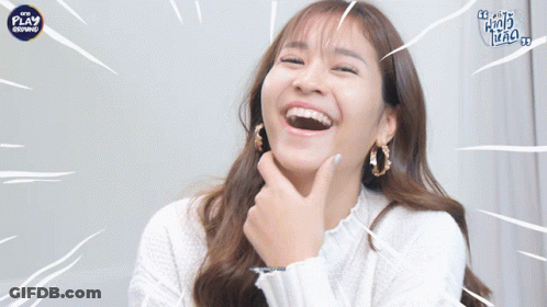 Woman Laughing In Front Of Play Ad GIF