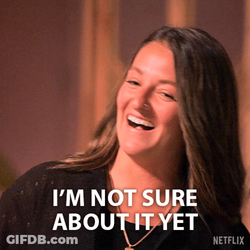 Woman Laughing Saying I'm Not Sure About It Yet GIF