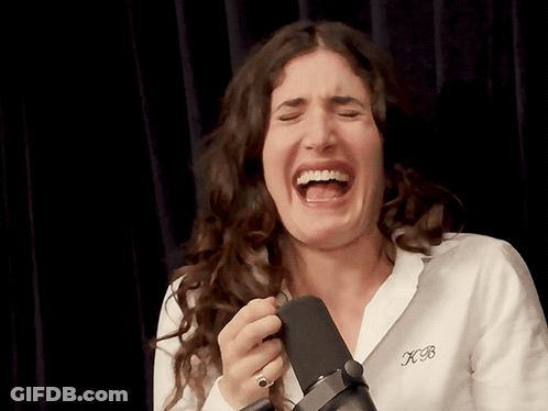 Woman Laughing Wearing XB Shirt GIF