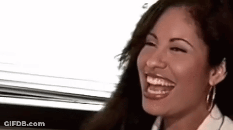 Woman Laughing With Eyes Closed In White Shirt GIF