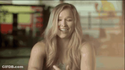 Woman Laughing With Hair Blowing GIF