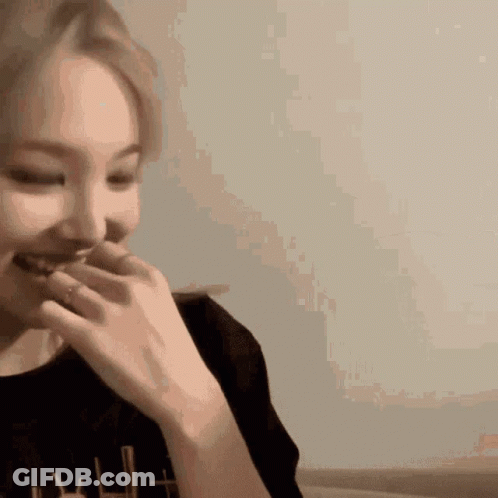 Woman Laughing With Hand On Mouth GIF