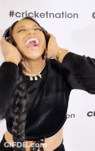 Woman Laughing With Headphones GIF