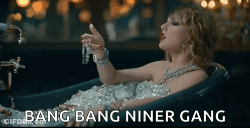 Woman Laying In Bathtub Covered In Ice Holding Necklace GIF