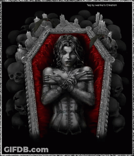 Woman Laying In Coffin Surrounded By Skulls And Candles GIF