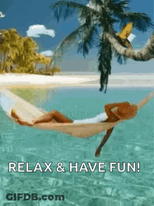 Woman Laying In Hammock On Tropical Beach GIF